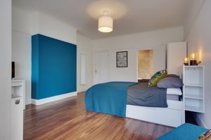 Bedroom One- click for photo gallery